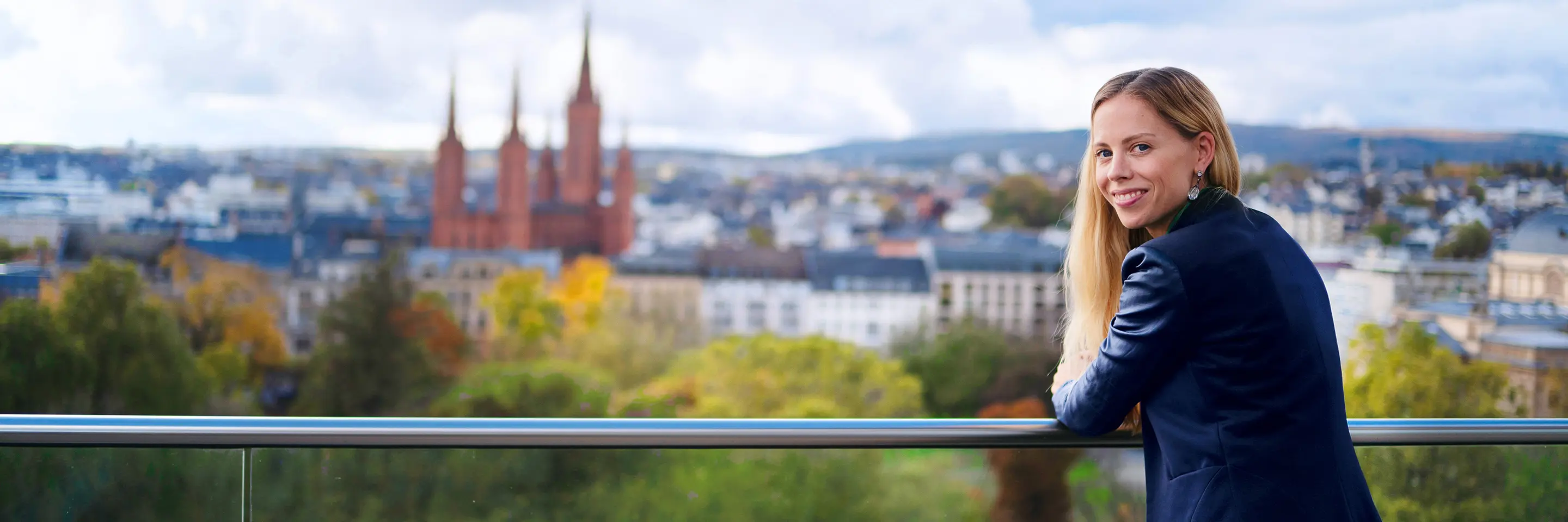 A woman looks out over Wiesbaden