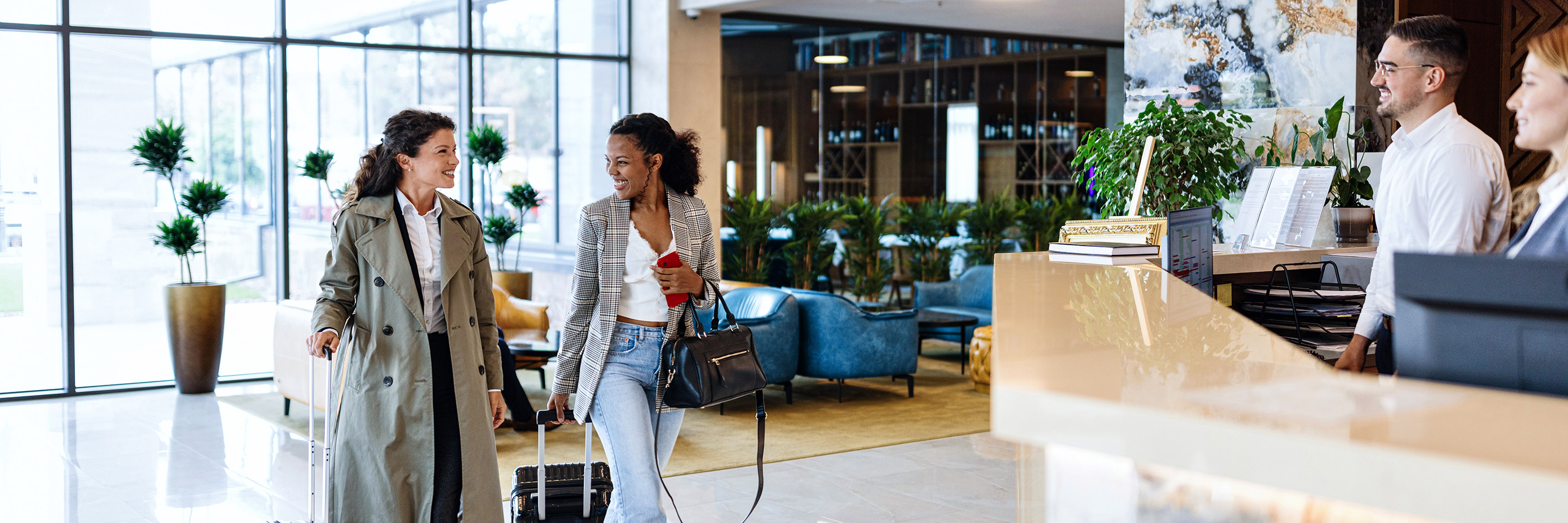Two women in a hotel lobby